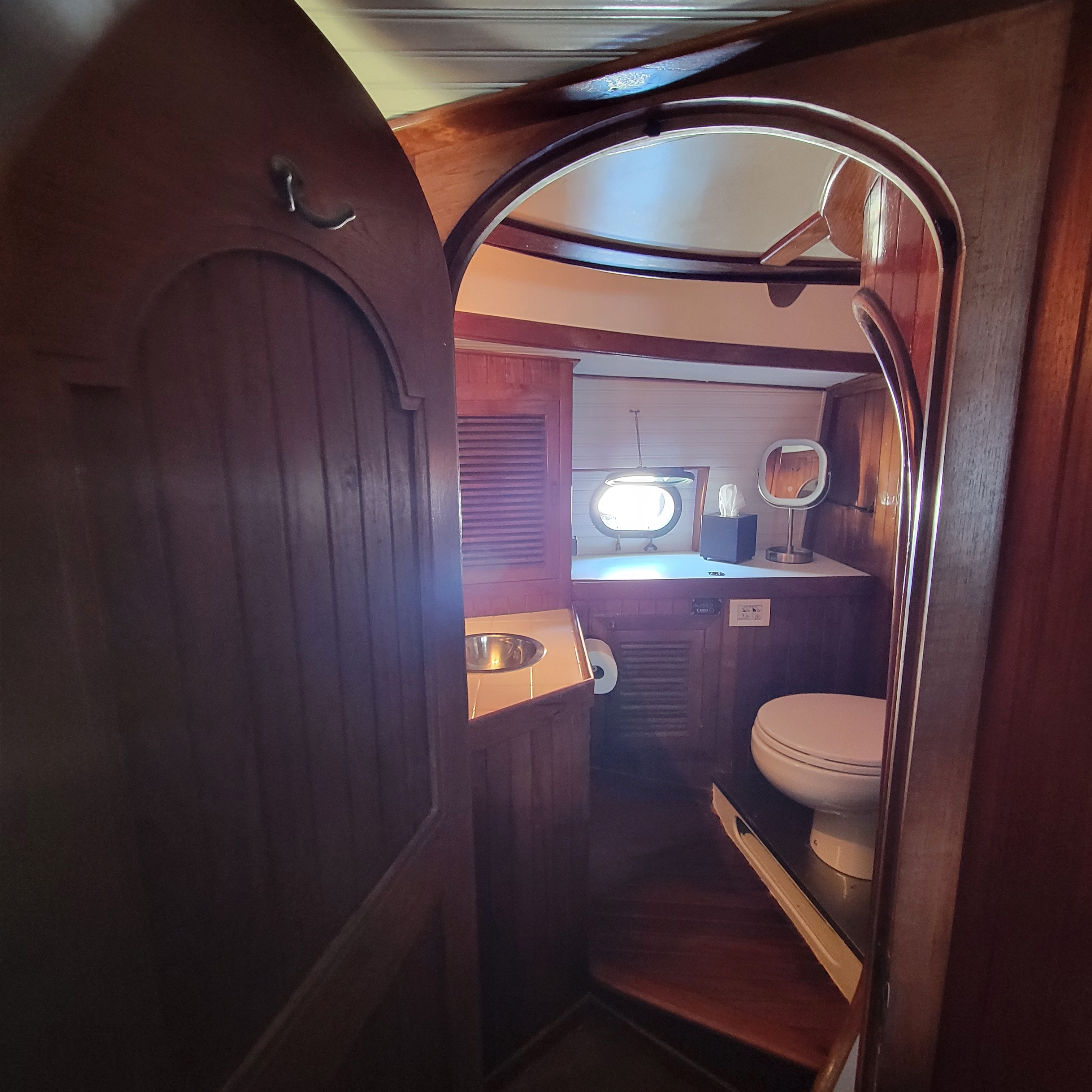 Master Head — Arched Teak Door